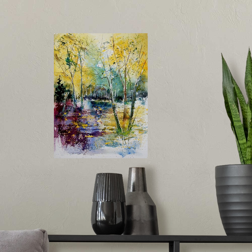 A modern room featuring Watercolor painting of a pond in a forest done in vibrant colors of yellow, green and blue.