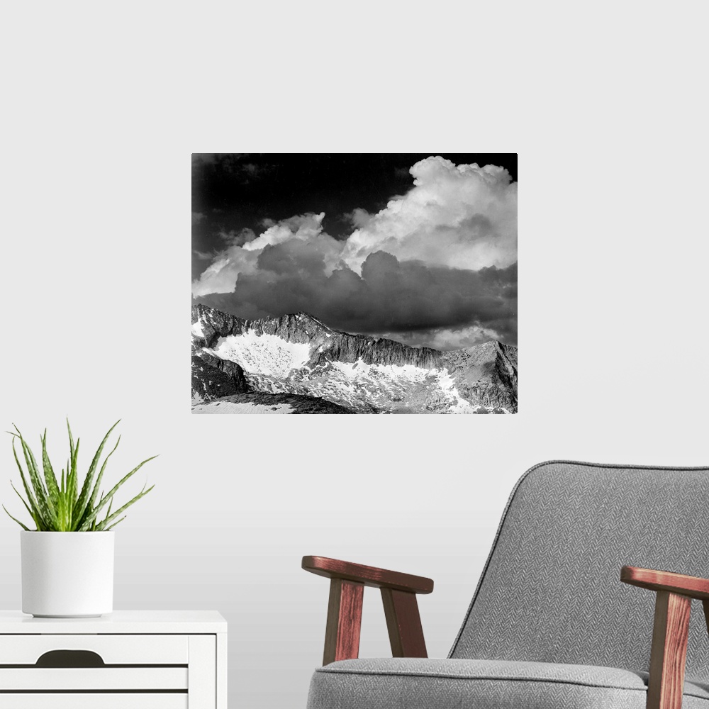 A modern room featuring Clouds - White Pass.