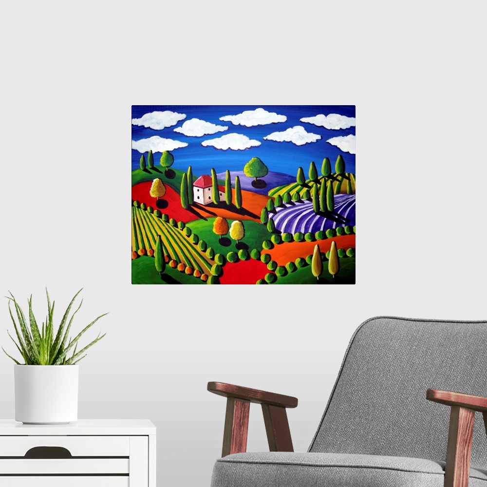 A modern room featuring Colorful painting of rolling hills and trees with a single house and white, fluffy clouds above.