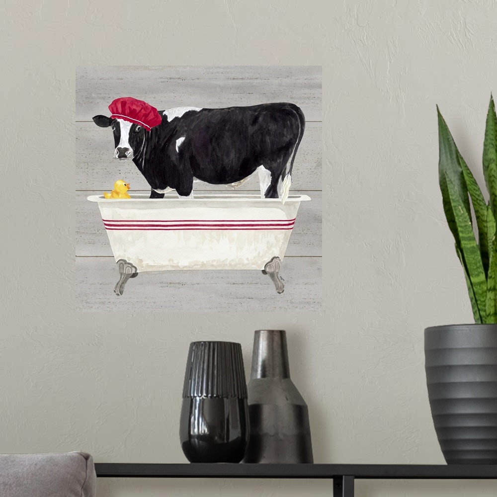 A modern room featuring Decorative artwork of a black and white cow standing in a bathtub with a shower cap on it's head ...