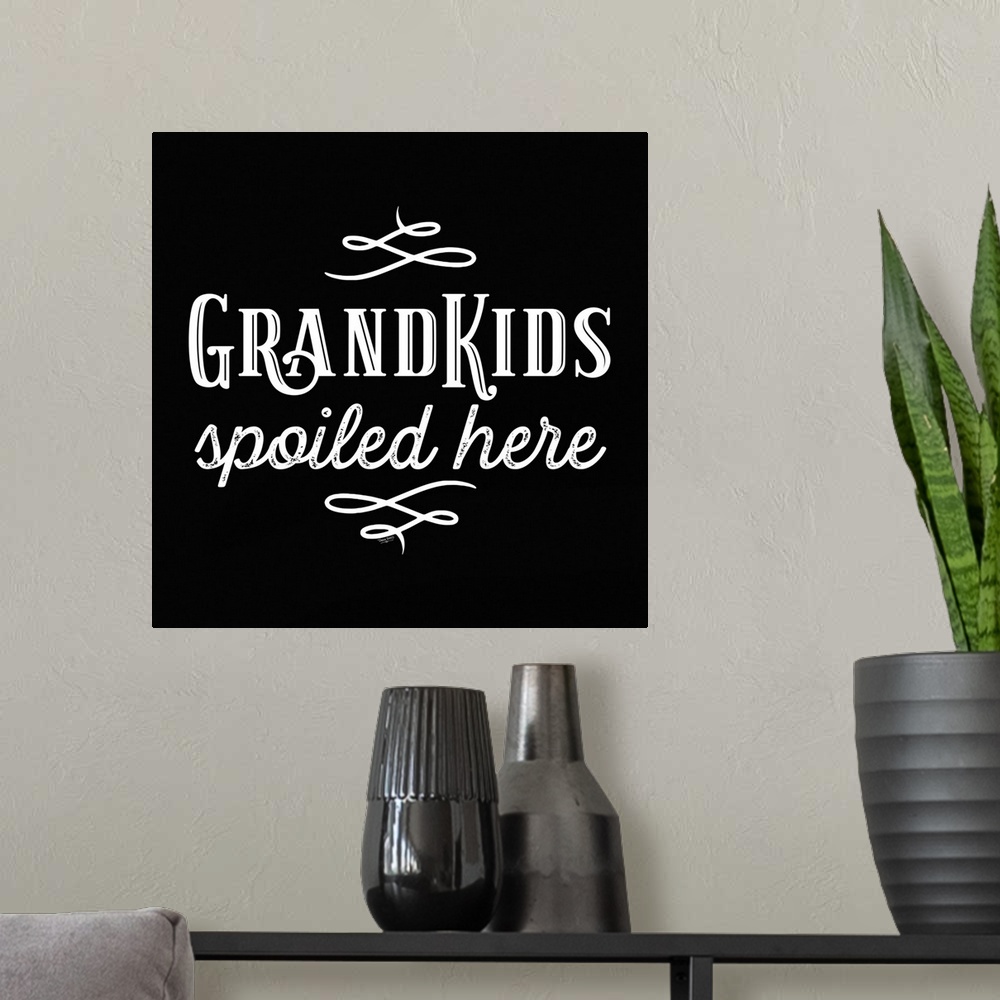 A modern room featuring Grandparent Life black XII-Spoiled Here