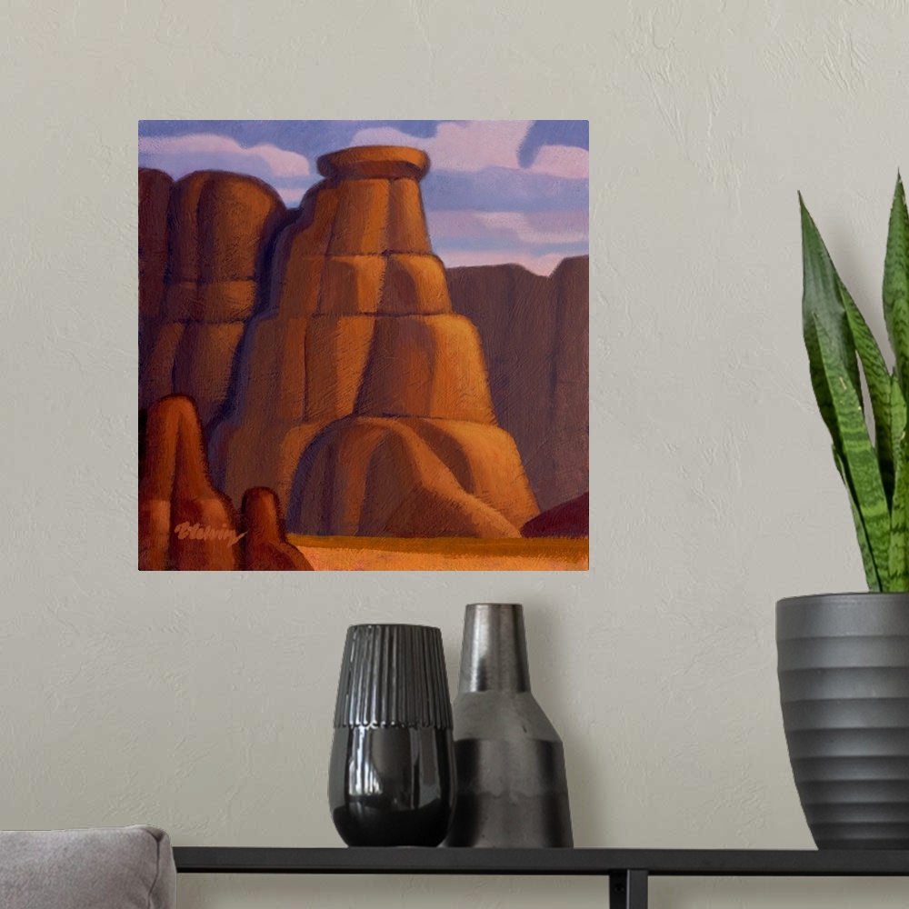 A modern room featuring Landscape painting of red rock canyon and cliffs.