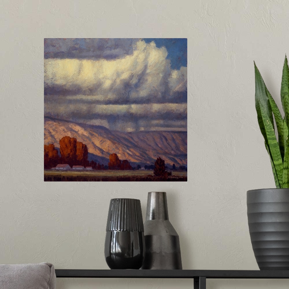 A modern room featuring Landscape painting of a mountain valley with the rain clouds of September.