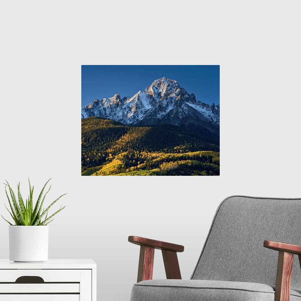 A modern room featuring Mount Sneffels with snow in the fall, Uncompahgre National Forest, Colorado, USA
