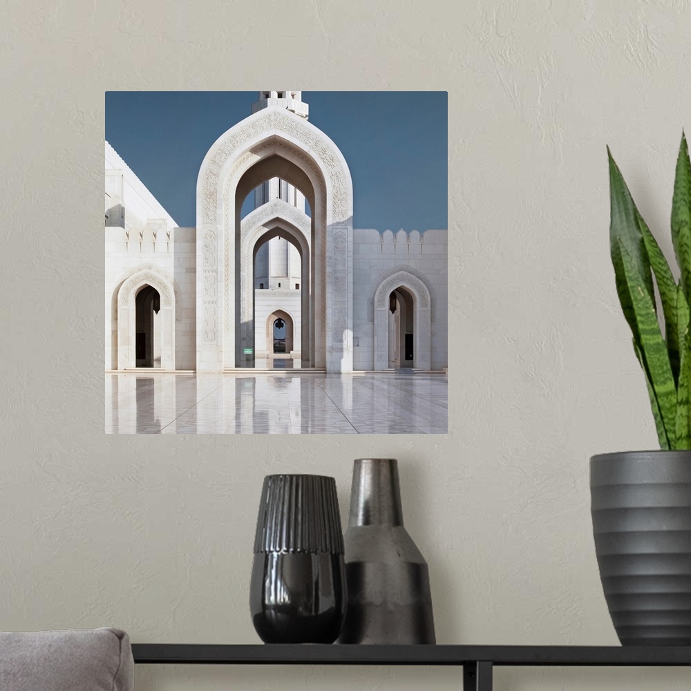 A modern room featuring Perspective on arches and minaret of Sultan Qaboos Mosque, Muscat, Oman, Middle East