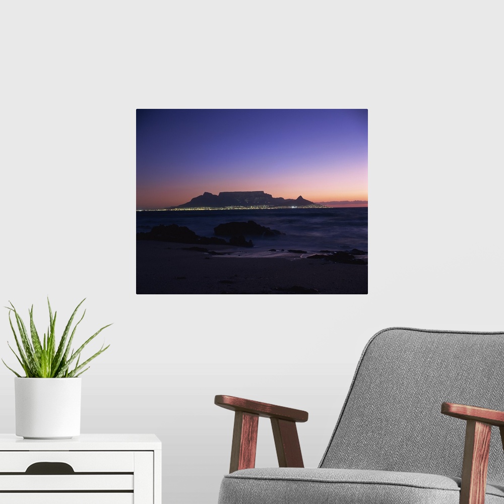 A modern room featuring Table Mountain at dusk, Cape Town, South Africa, Africa