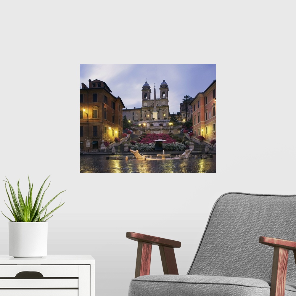 A modern room featuring The Spanish Steps illuminated in the evening, Rome, Lazio, Italy
