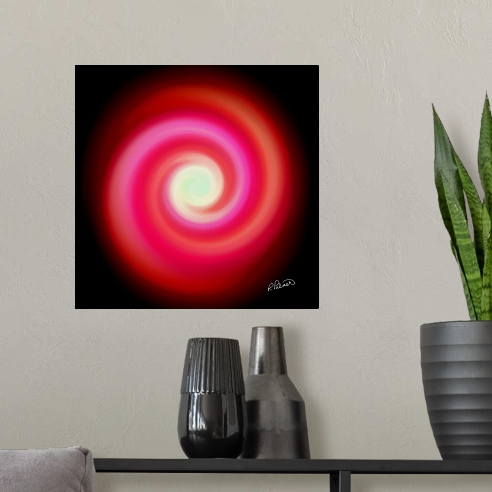 A modern room featuring Square image of swirls of colors in red and pink, forming a circle.