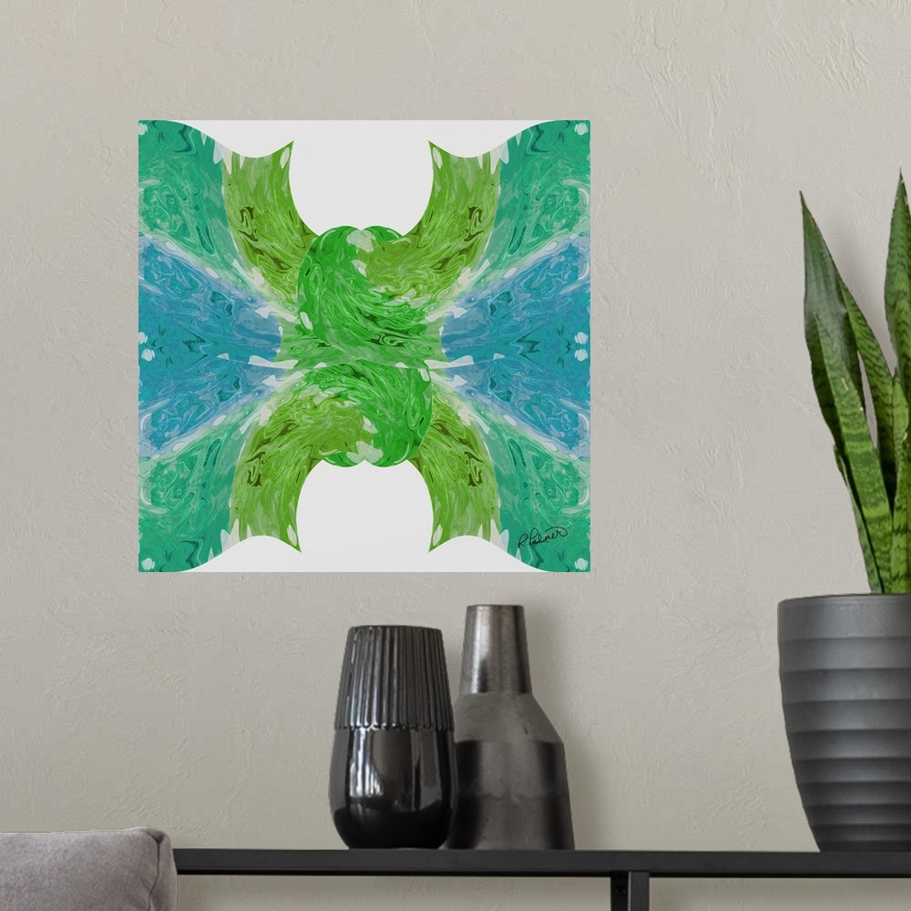 A modern room featuring A square design of blue and green colors in the shape of a knot on a white backdrop.