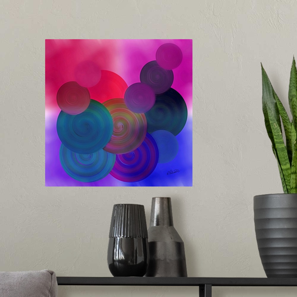 A modern room featuring Varies sizes of circles in different colors overlapping each other on a bright pink and blue back...