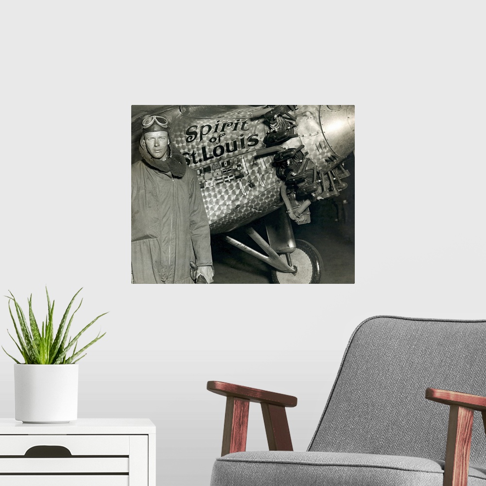 A modern room featuring Vintage photo on canvas of Lindbergh in front of the Spirit of St. Louis after the first transatl...