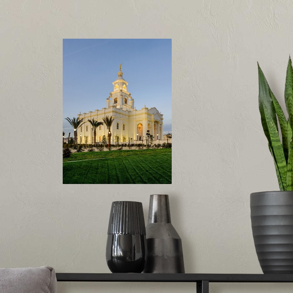 A modern room featuring The Tijuana Mexico Temple is located in Baja California. The entrance of the temple is adorned wi...