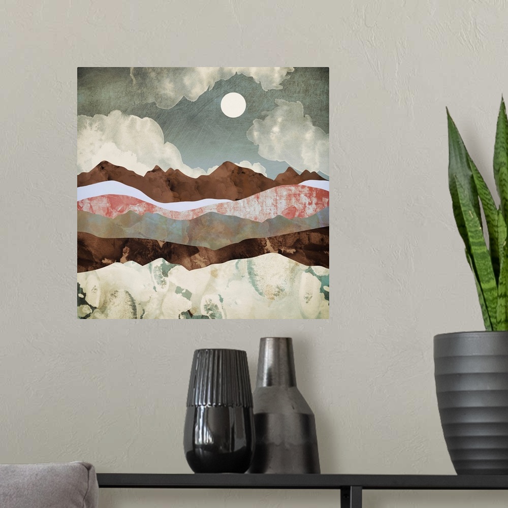 A modern room featuring Abstract depiction of a landscape with mountains, clouds, brown and pink.