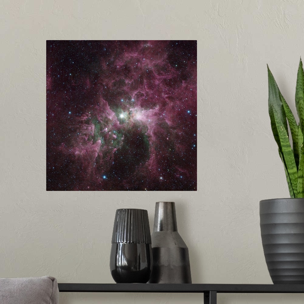 A modern room featuring Infrared view of the Carina Nebula. The bright star at the center of the nebula is Eta Carinae, o...
