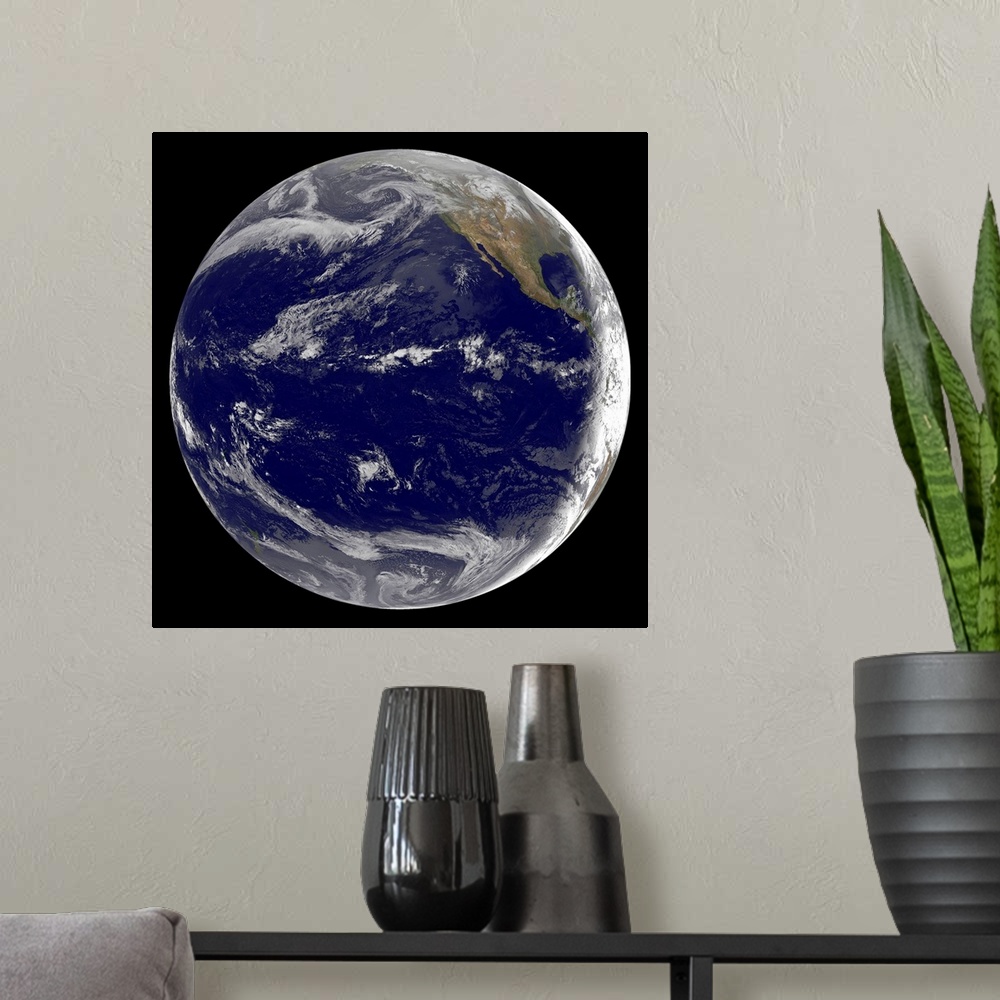 A modern room featuring Satellite image of Earth over the Pacific Ocean on March 11, 2011. Waves from the powerful 8.9 Ri...