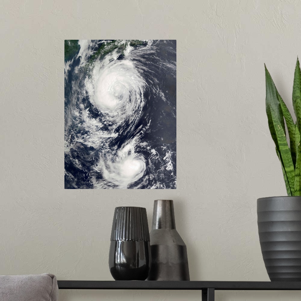 A modern room featuring Two Typhoon systems approaching the Far East