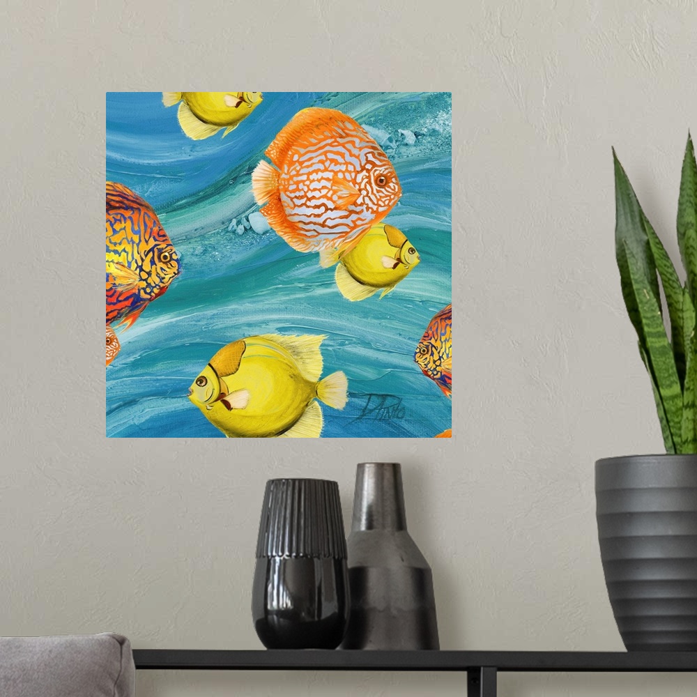 A modern room featuring Decorative artwork of a group of tropical fish in yellow and orange.