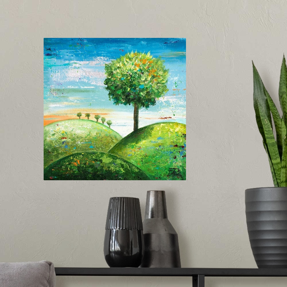 A modern room featuring Contemporary painting of a round tree on a green hillside.
