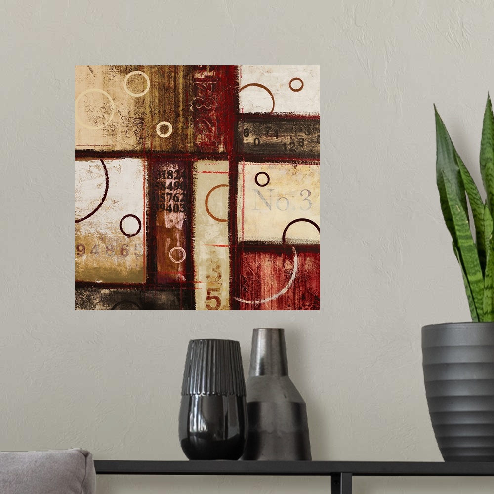 A modern room featuring Contemporary abstract art of blocks and circles of dark colors laid overtop of digital numbers.