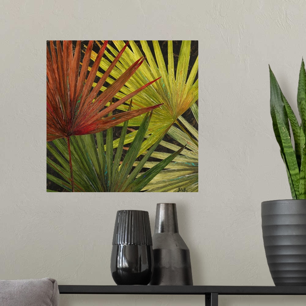 A modern room featuring Large artwork of various colored palm tree leaves that overlap each other.