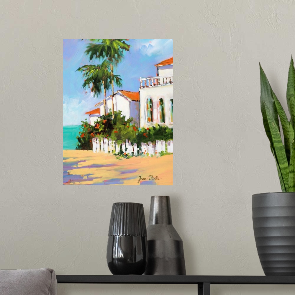 A modern room featuring Contemporary painting of a shore house with palm trees overlooking the ocean.