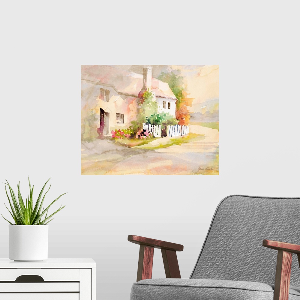 A modern room featuring Contemporary watercolor painting of a countryside cottage with a white picket fence out front.