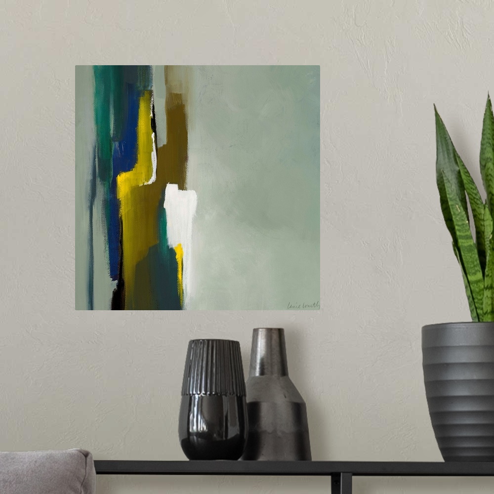 A modern room featuring Modern art consisting of streaks of color in one quadrant of the painting. Streaks of color clash...
