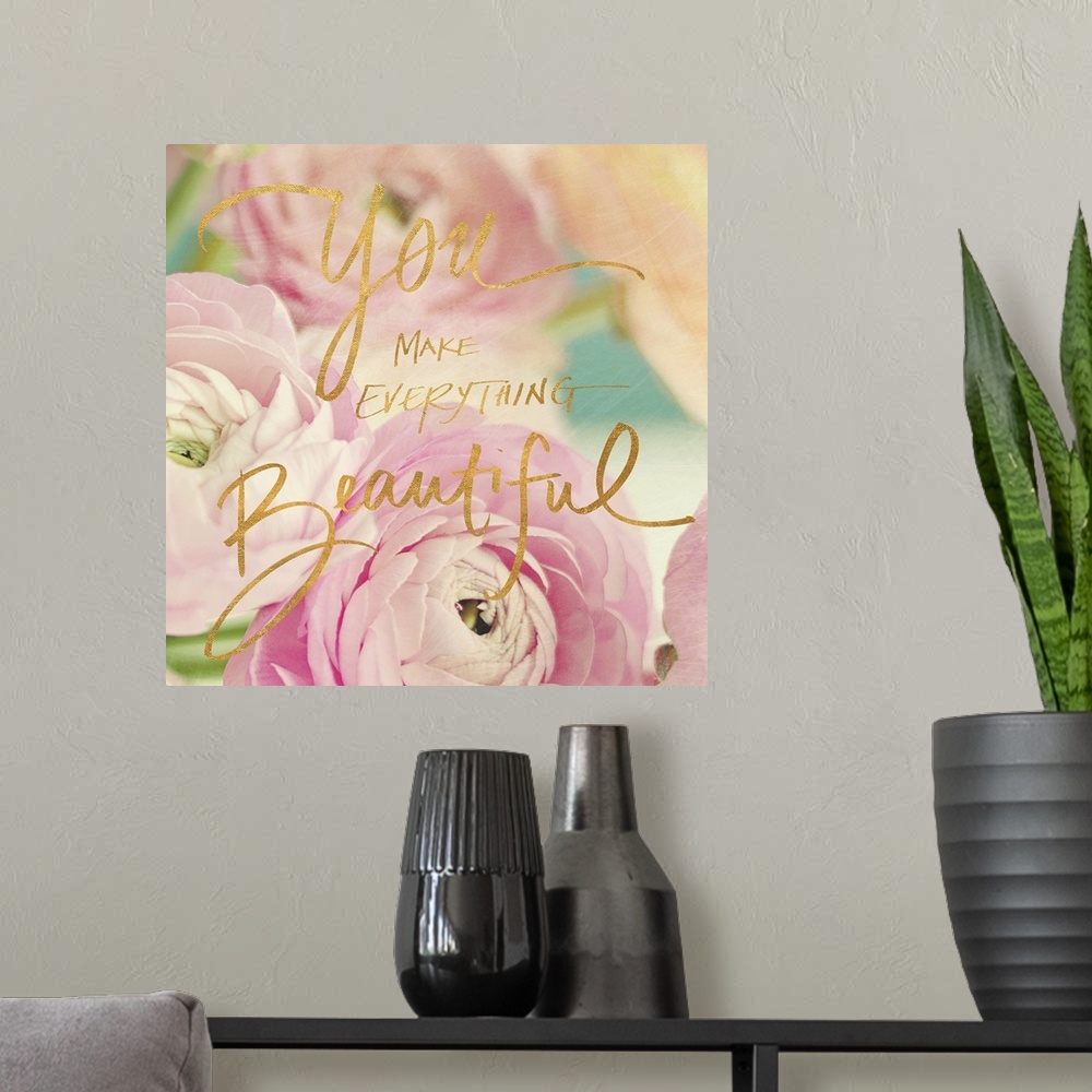 A modern room featuring Pastel-toned image of pink flowers with the phrase "You make everything beautiful" hand written o...