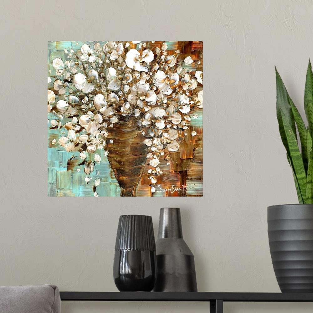 A modern room featuring Abstract contemporary white floral bouquet in vase.