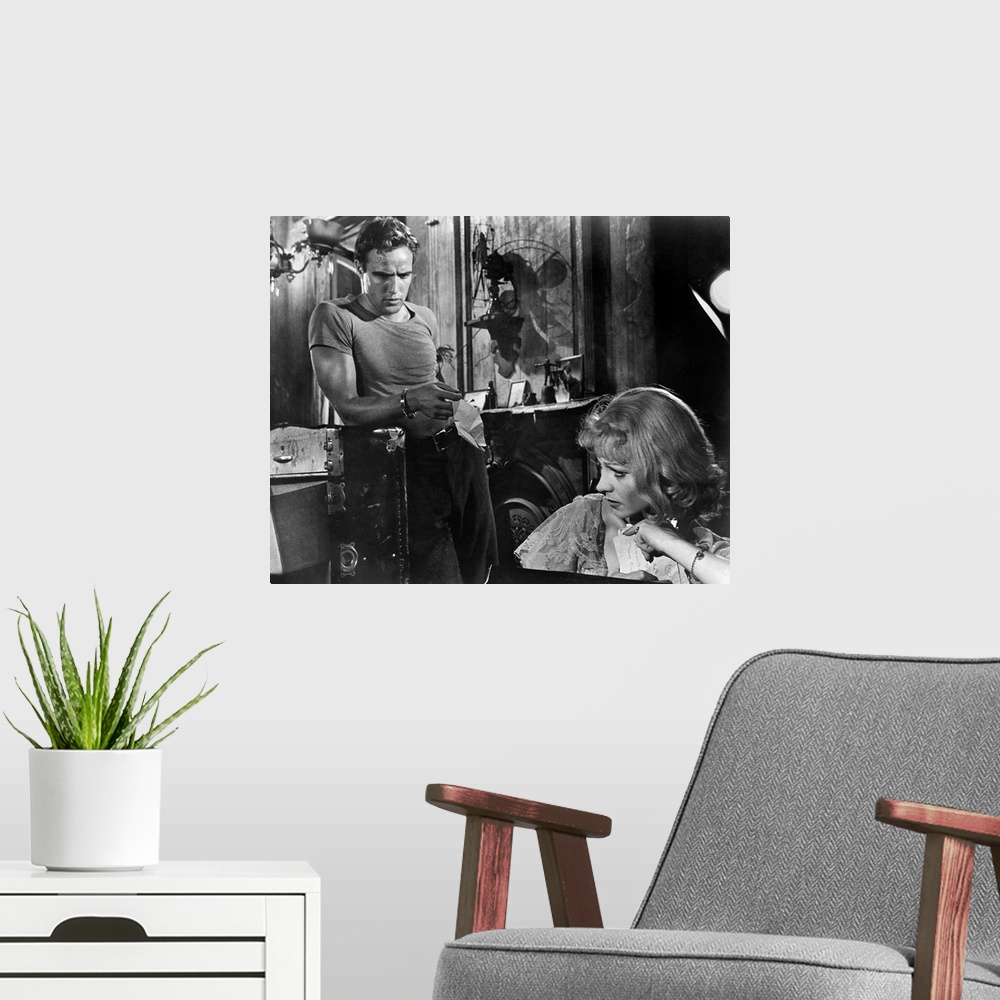 A modern room featuring Marlon Brando as Stanley Kowalski and Vivien Leigh as his sister-in-law Blanche DuBois in the fil...