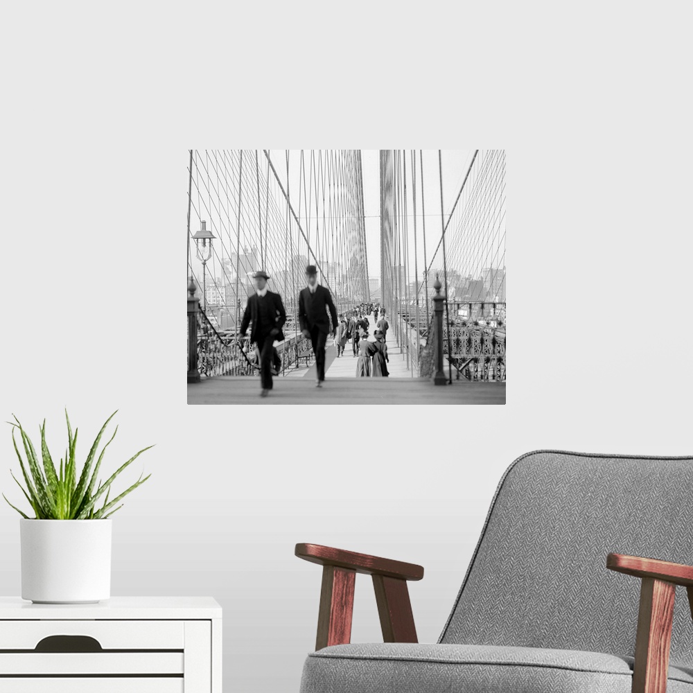 A modern room featuring The Brooklyn Bridge, New York City. Photograph, c1910.