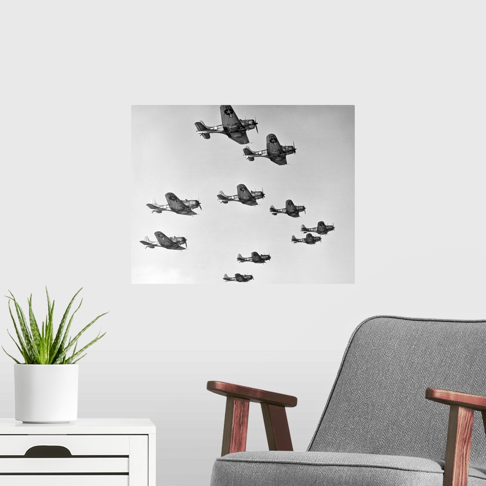 A modern room featuring A victory formation of U.S. Douglas Dauntless Dive Bombers. U.S. Douglas Dauntless Dive Bombers w...