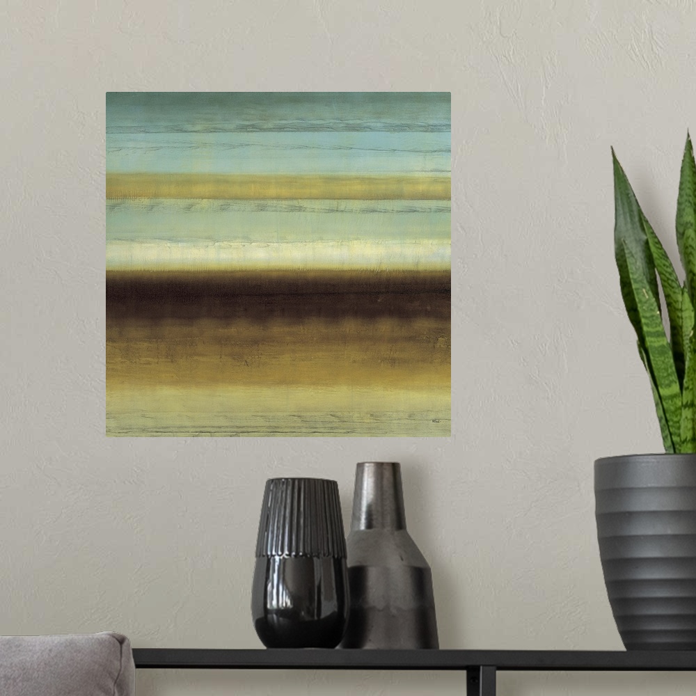 A modern room featuring Contemporary abstract painting using subtle warm and cool colors meeting face to face.