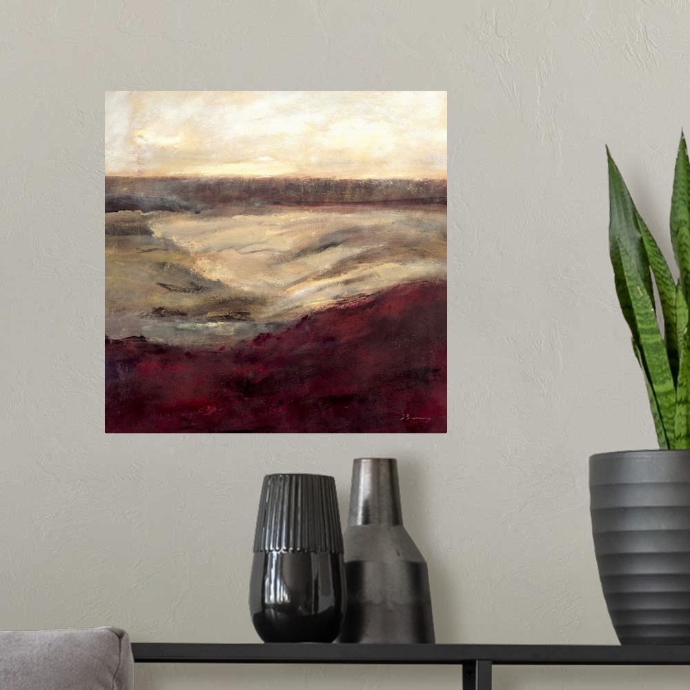 A modern room featuring Contemporary abstract painting using warm tones resembling a landscape.