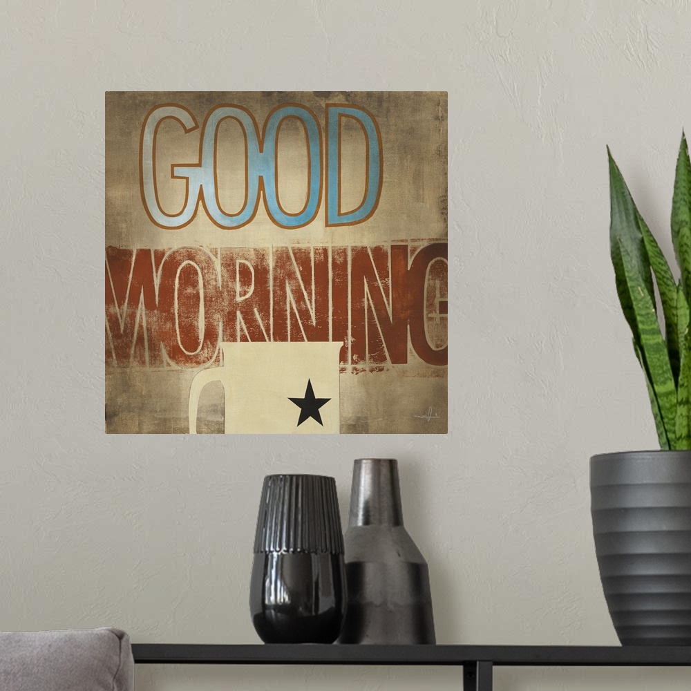 A modern room featuring Decorative artwork of a cup of coffee with the text "Good Morning" in rustic browns and blue.
