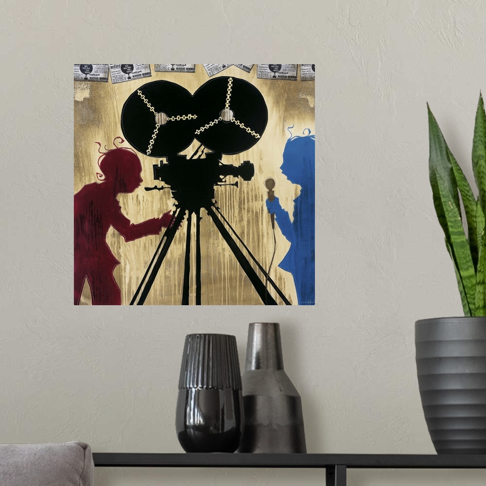 A modern room featuring A painting of a camera man in red silhouette pointing a camera at man in blue silhouette holding ...