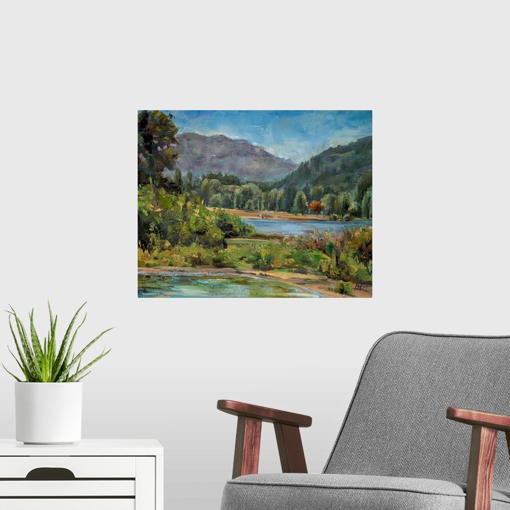 A modern room featuring Contemporary landscape painting with a mountain in the background.