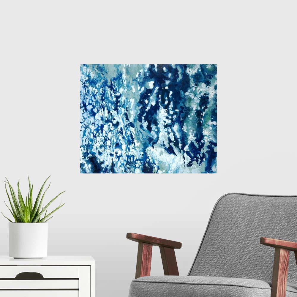 A modern room featuring Abstract painting with shades of blue marbled together with white.