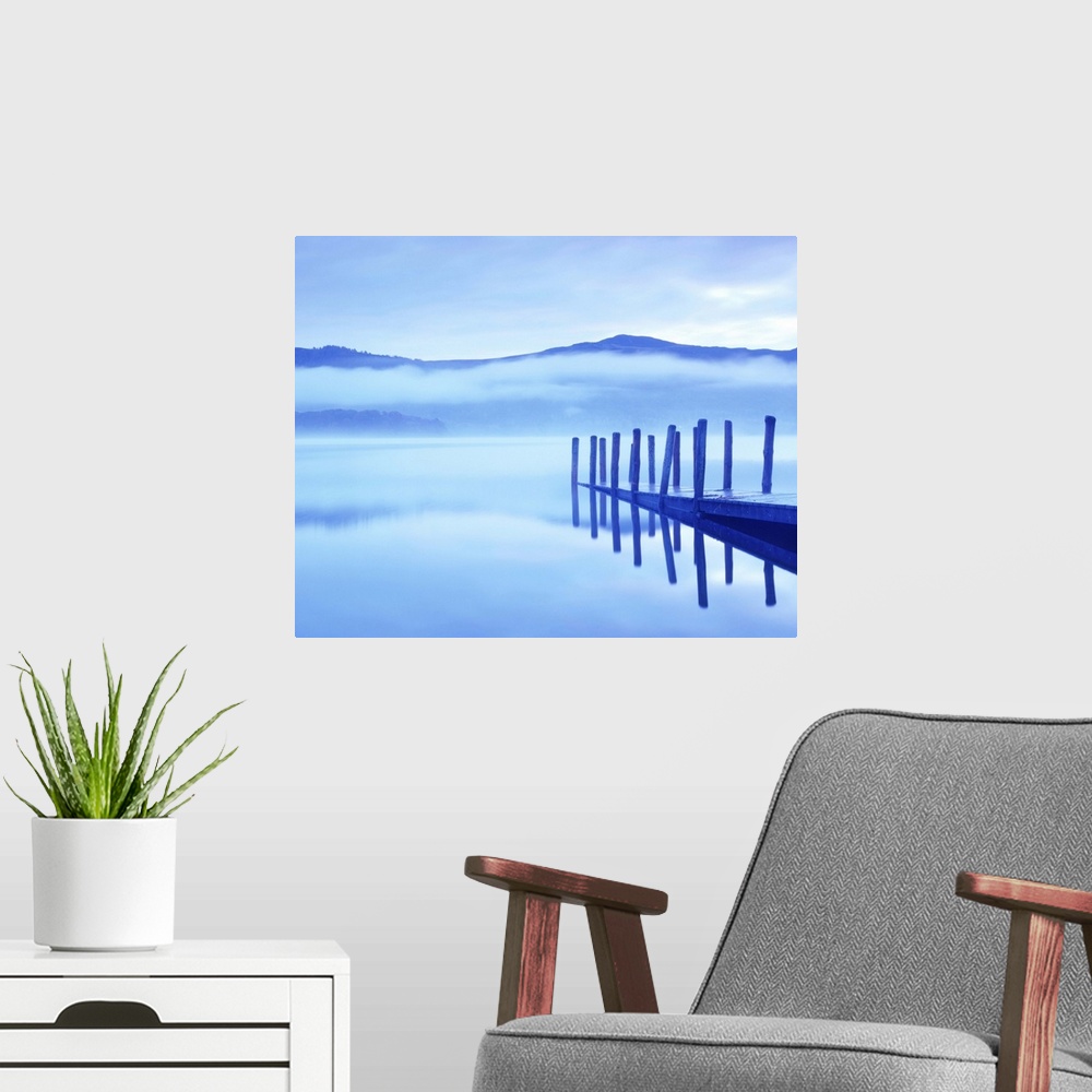 A modern room featuring Early morning mist over Derwent Water, Lake District, Cumbria.