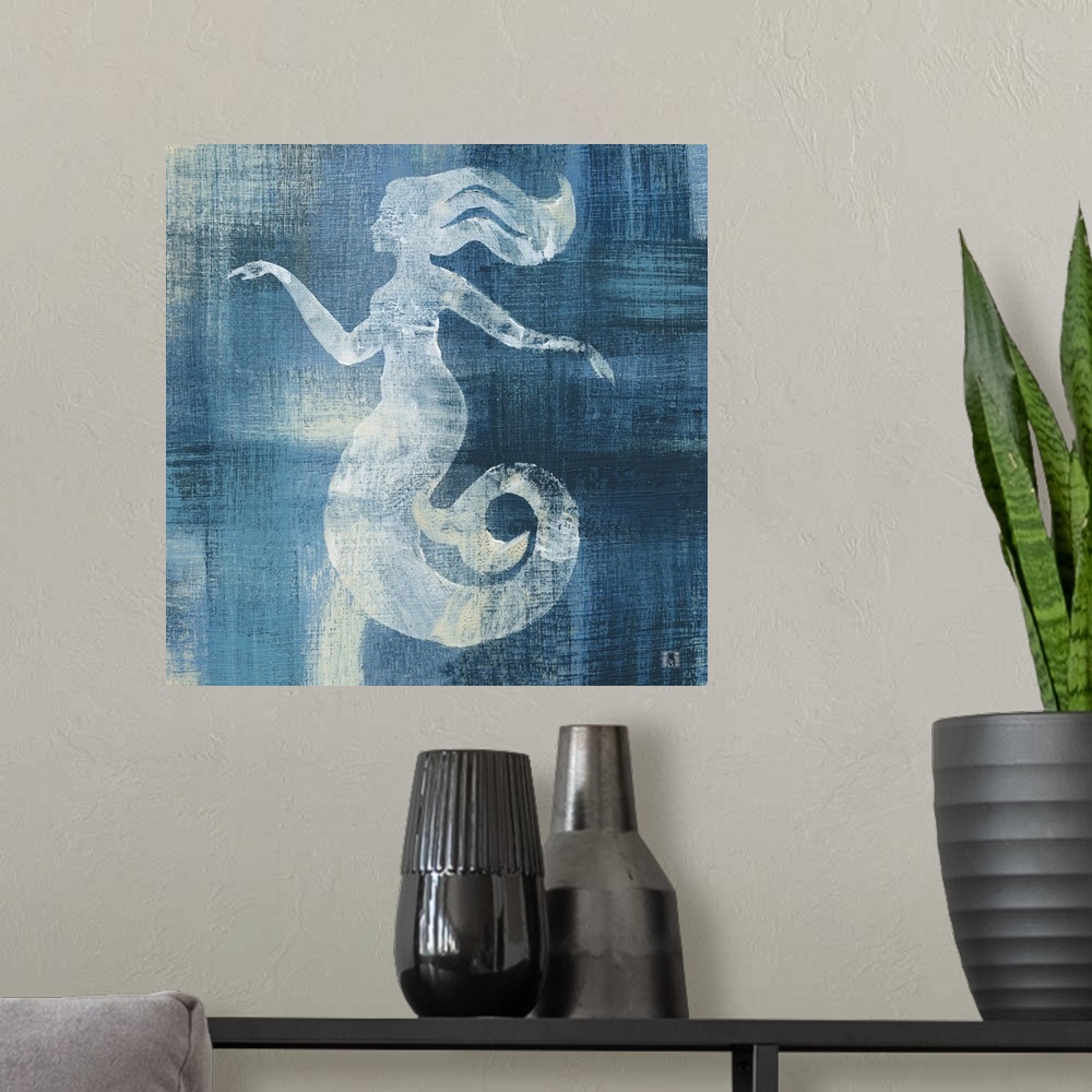 A modern room featuring Square artwork of a white mermaid among a white and blue brushed finish.