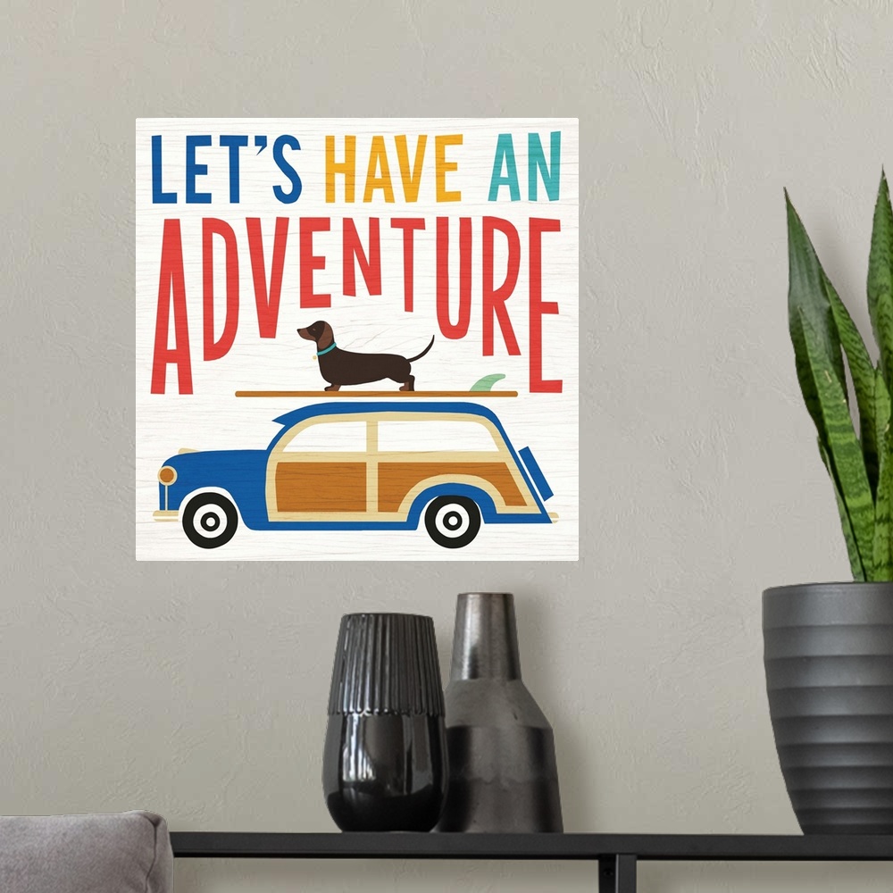 A modern room featuring "LET'S HAVE AN ADVENTURE" illustration of a dachshund on top of a surf board on top of a wagon, h...