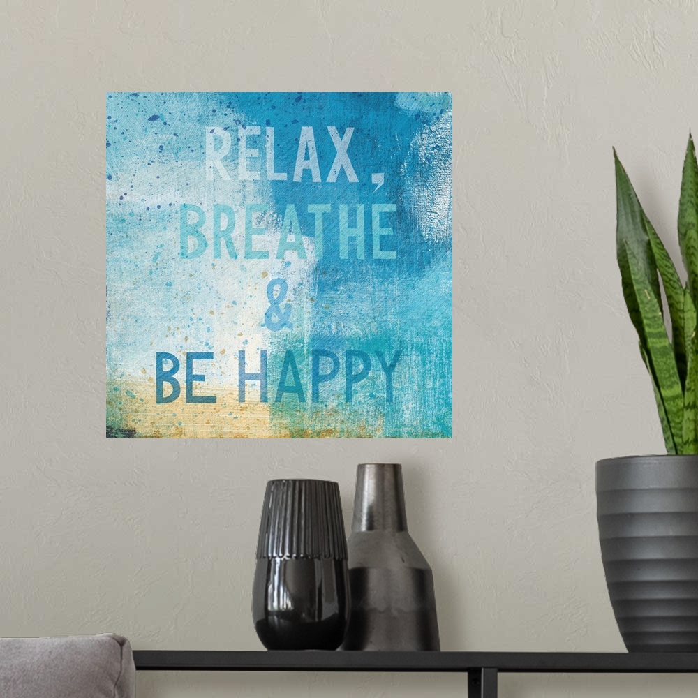 A modern room featuring "Relax, Breathe, and Be Happy"