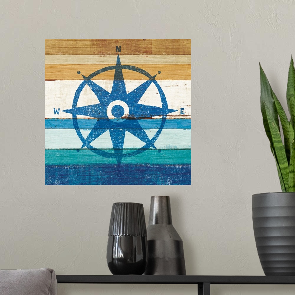 A modern room featuring Blue rose compass on a blue and brown painted wood background.