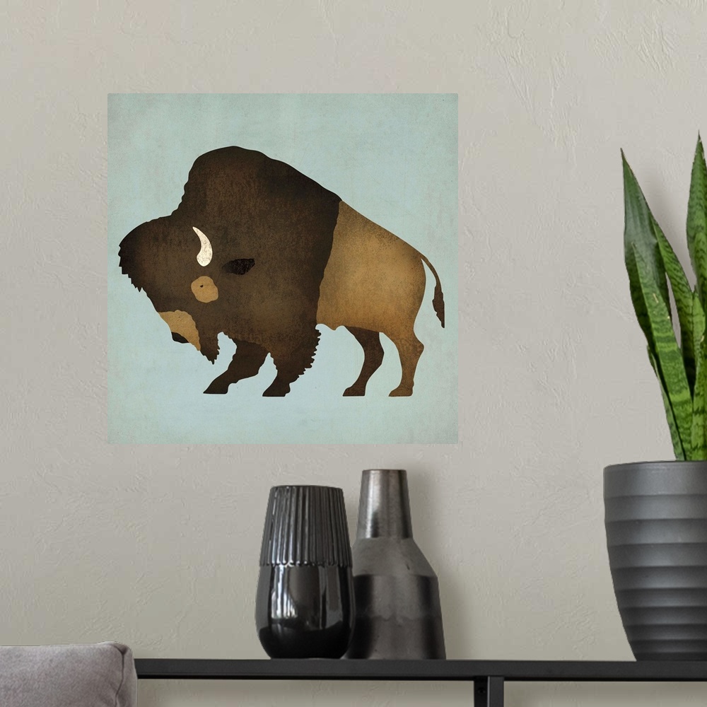 A modern room featuring Artwork of a furry buffalo with white horns on a pale blue background.