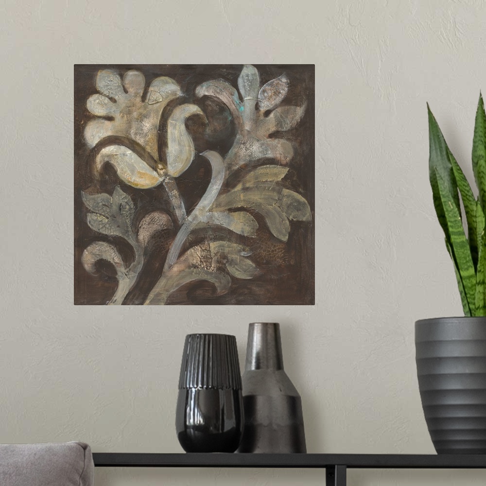 A modern room featuring Square painting of a cream colored flower with beige leaves on a brown background with a tiny hin...