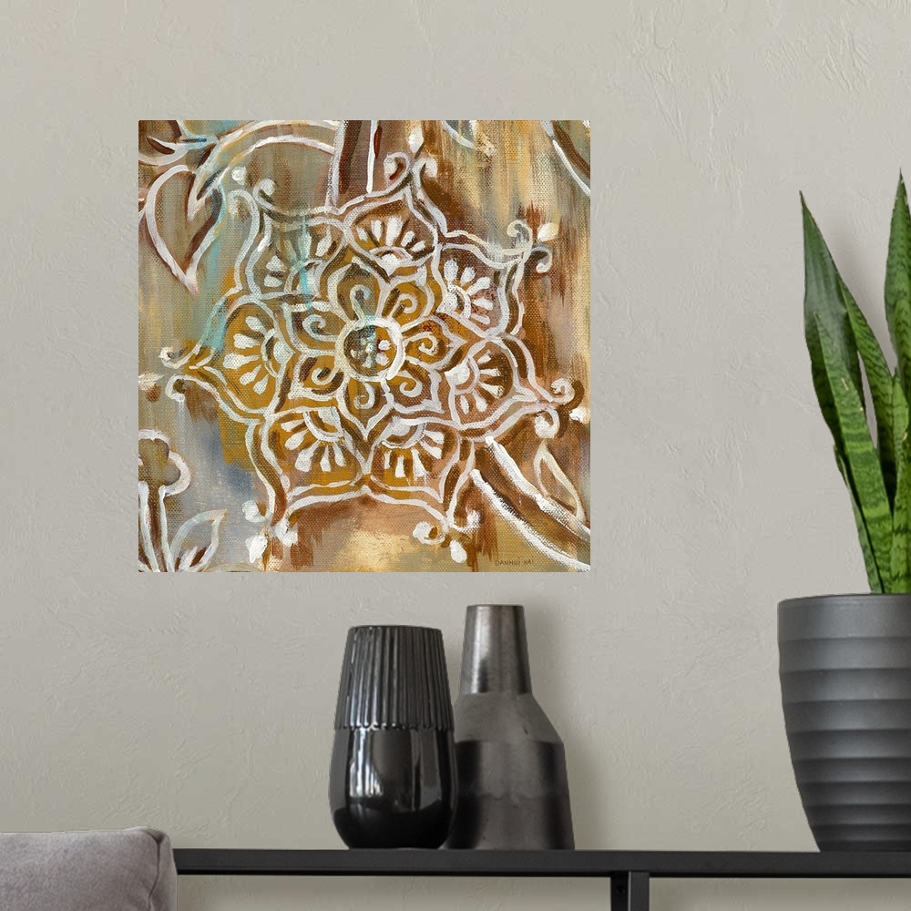 A modern room featuring Square painting of henna style art with neutral colors and a touch of light blue.