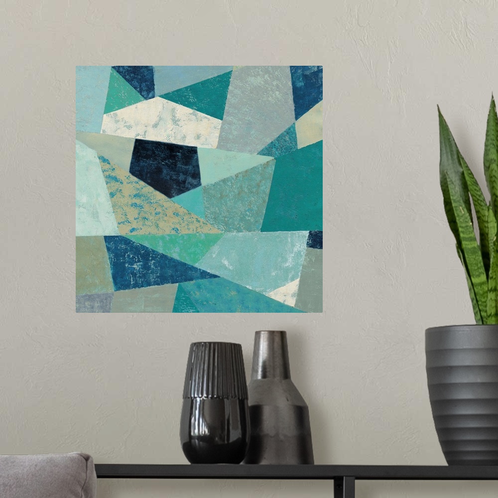 A modern room featuring Contemporary geometric artwork using cool green and blue colors with a retro mid-century vibe.