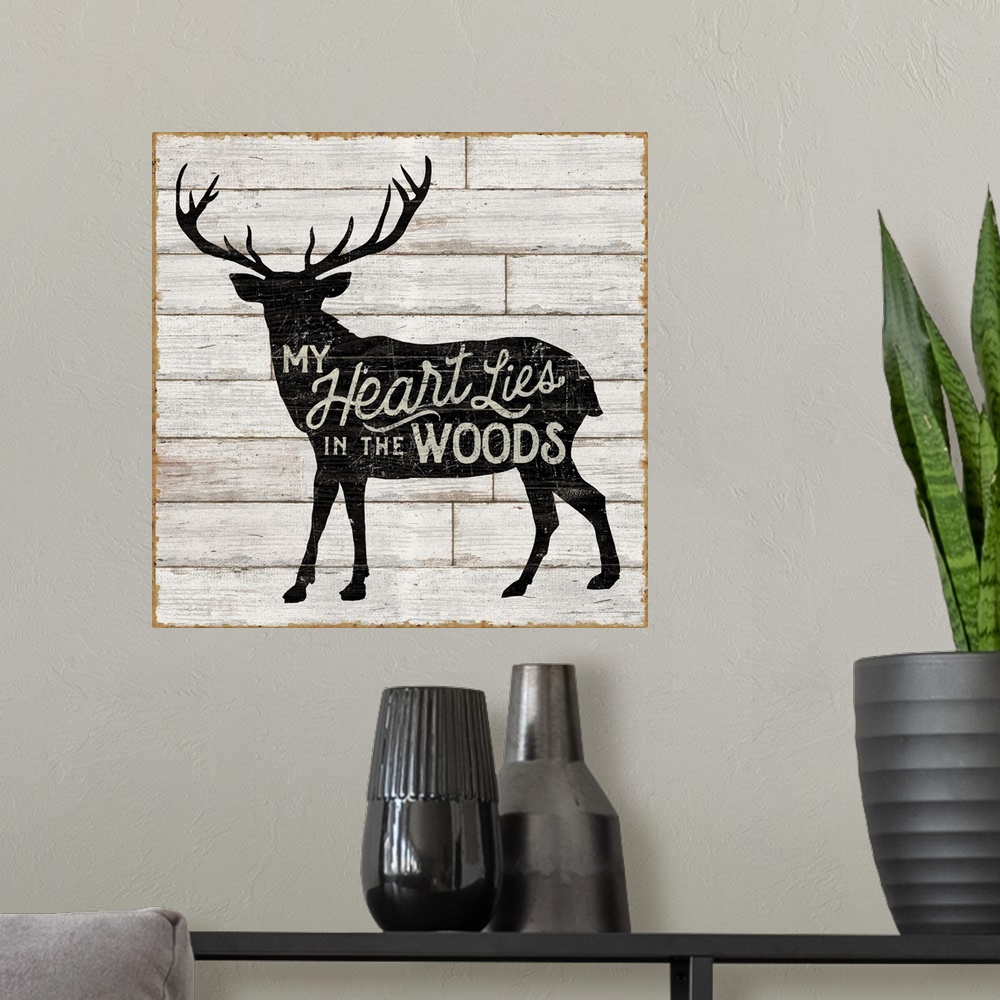 A modern room featuring Contemporary rustic cabin decor artwork of a silhouetted nature element with a typographic sentim...
