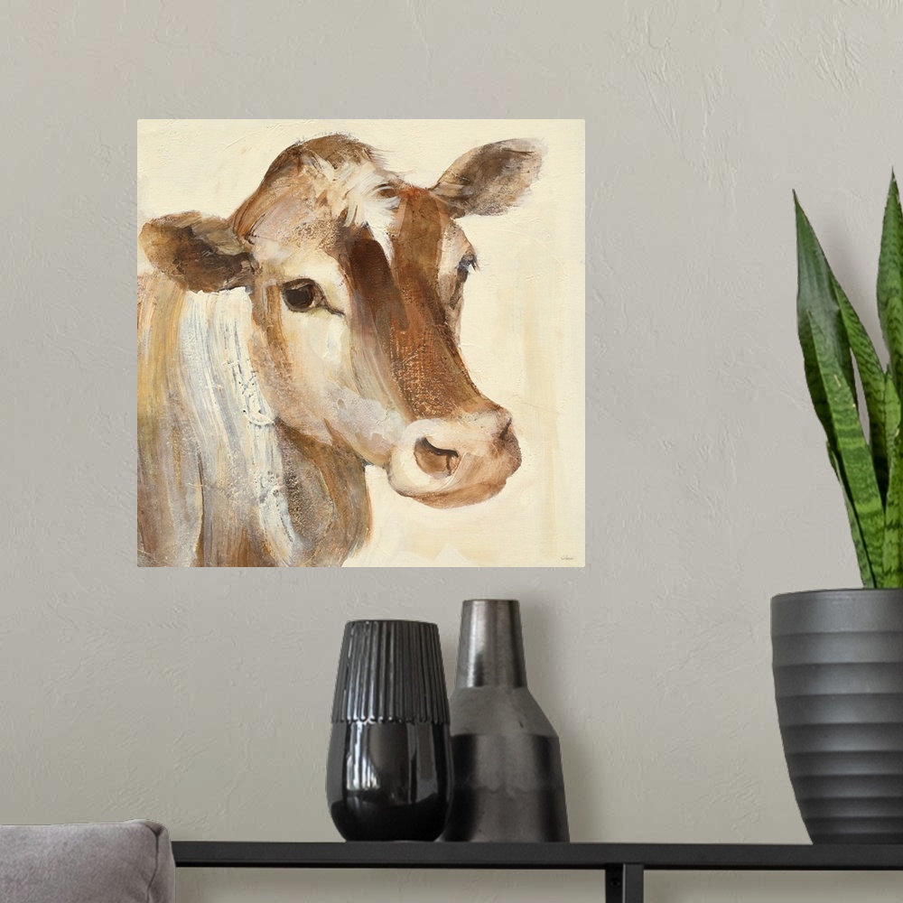 A modern room featuring Square contemporary painting of a cow in warm tones of color.