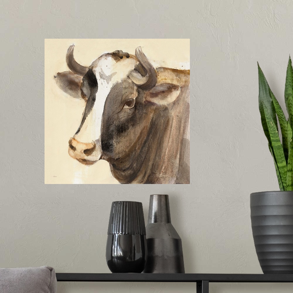 A modern room featuring Square contemporary painting of a bull in warm tones of color.
